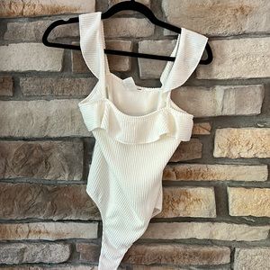 Caution to the Wing Tank